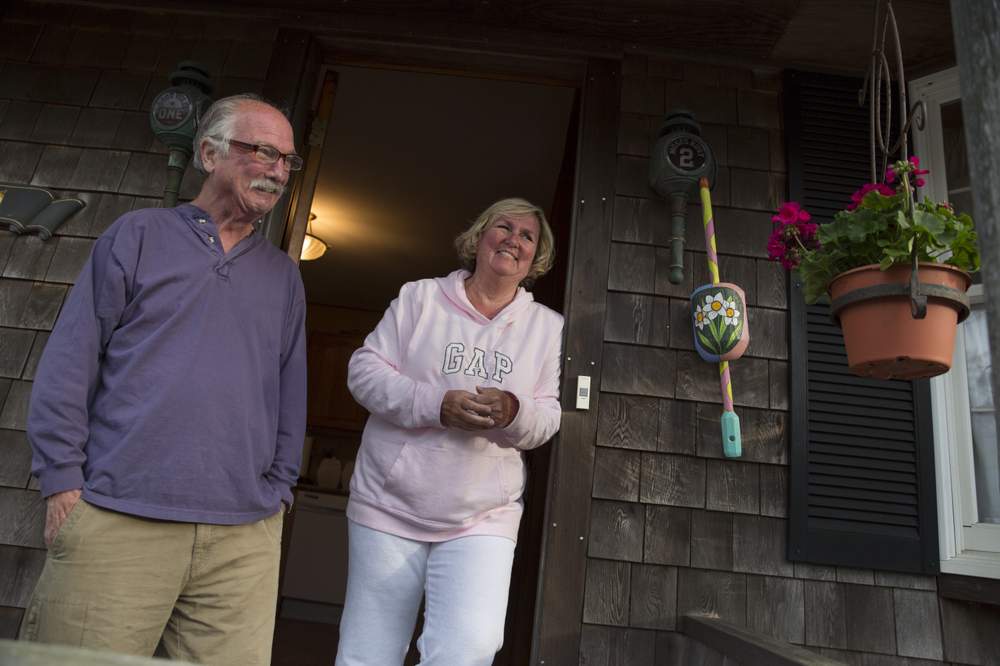 Dave and Chris Lazzaro's flood insurance rates have been rising for years, but they disagree about whether they would risk living in their home without insurance.
