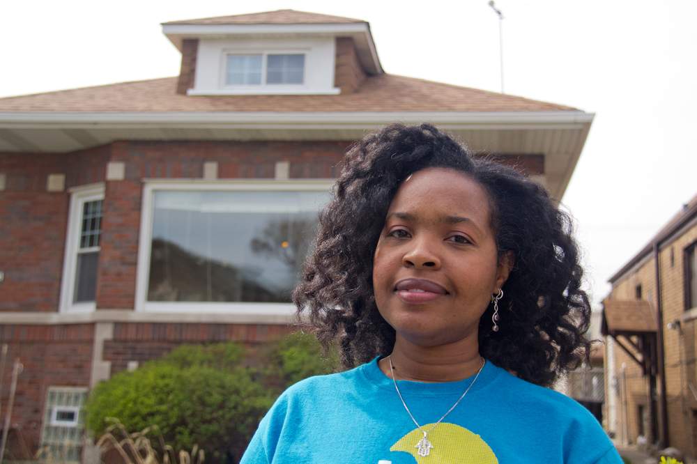 Lori Burns outside her home in Chatham.